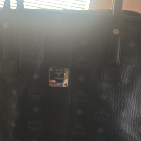 MCM Black and White in excellent condition. Some small...